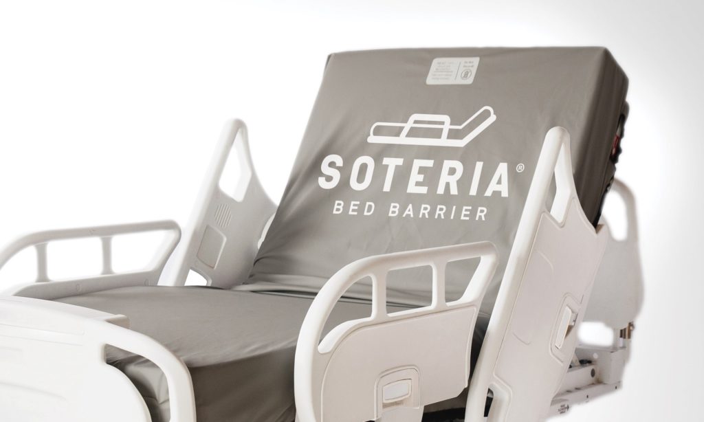 Soteria Bed Barrier installed on a hospital bed